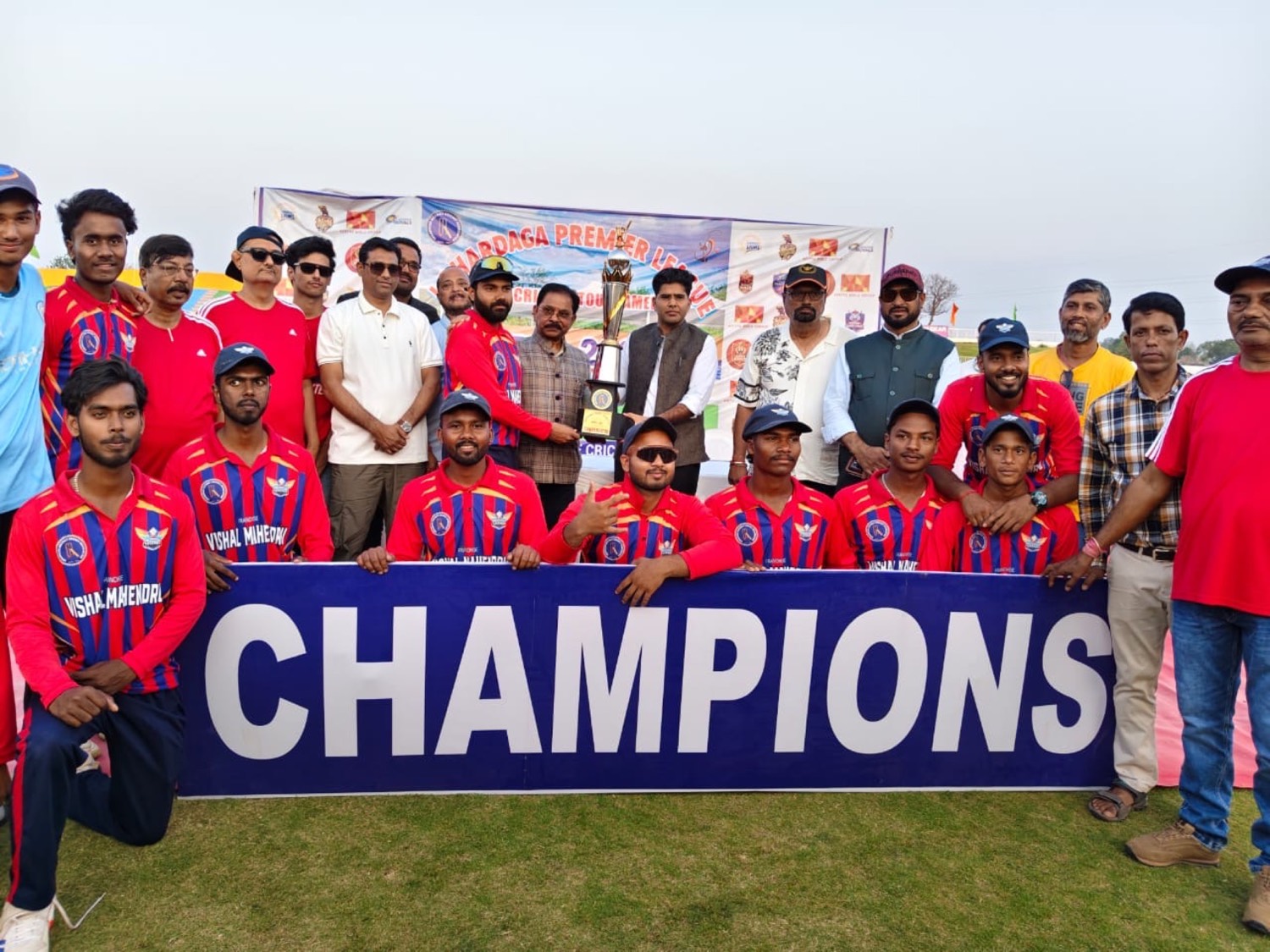 The Lohardaga Premier League champions with the trophy at the presentation