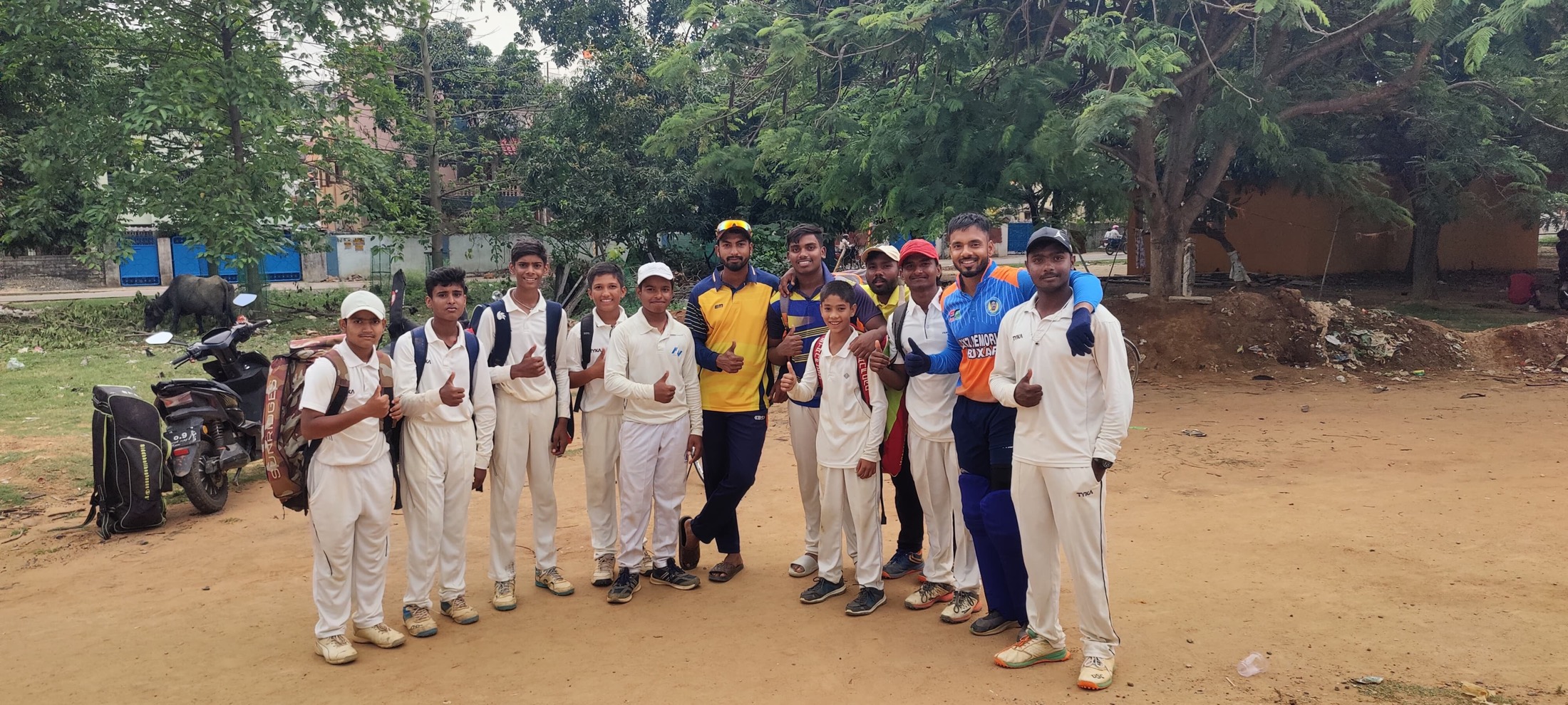 RPCA juniors and coaches lined up on the ground after a match