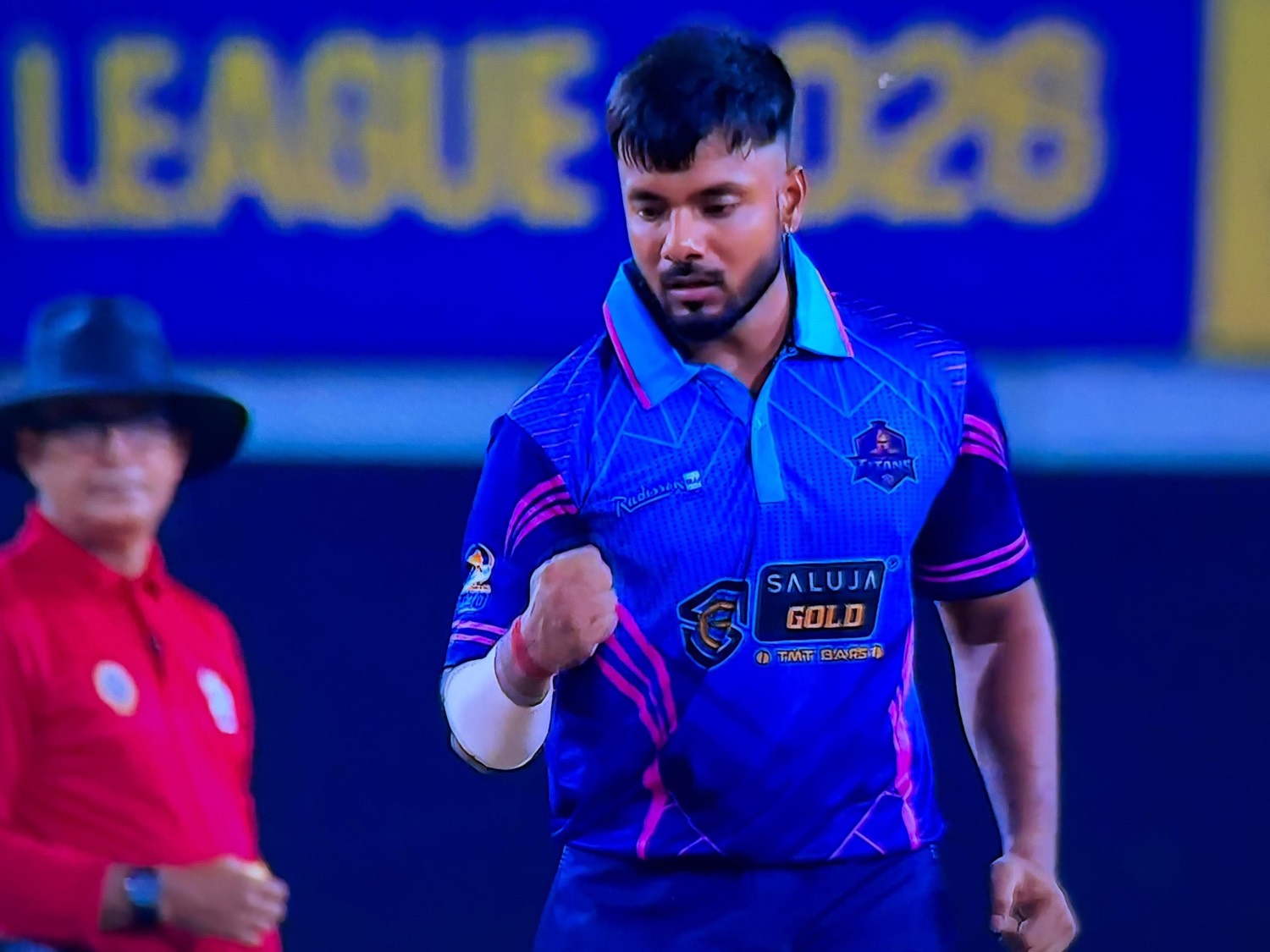 Yuvraj Kumar bowling for the Ranchi Titans under floodlights