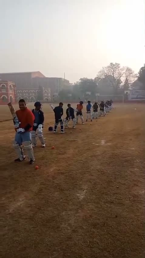 Players lined up for morning fielding drills